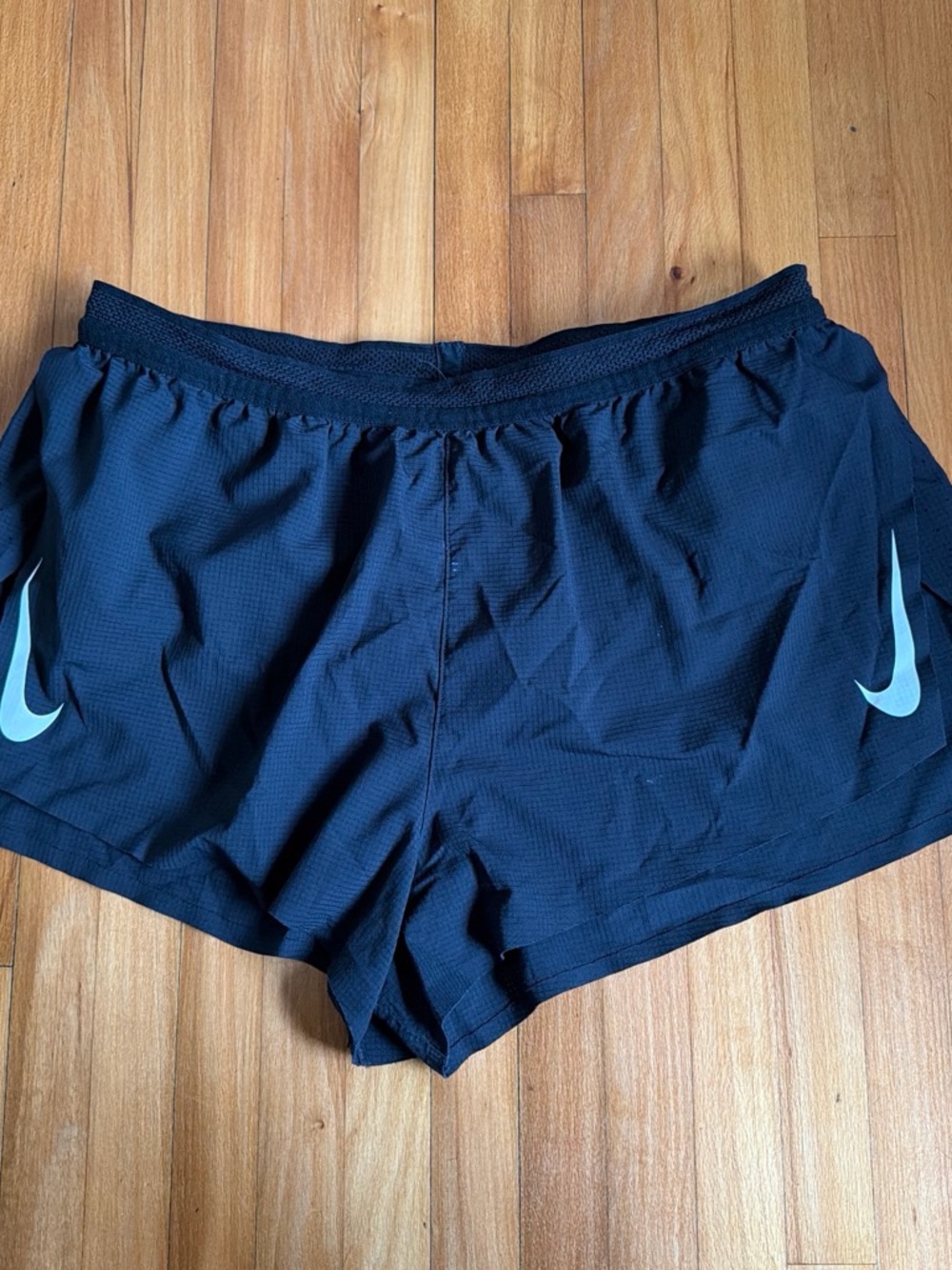 Nike Women’s Black Athletic Shorts with White Swoosh